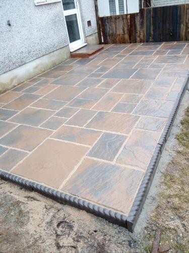 Rear garden patio with decorative border
