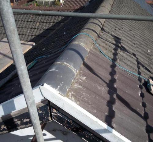 Roof ridge tiles that have been repaired